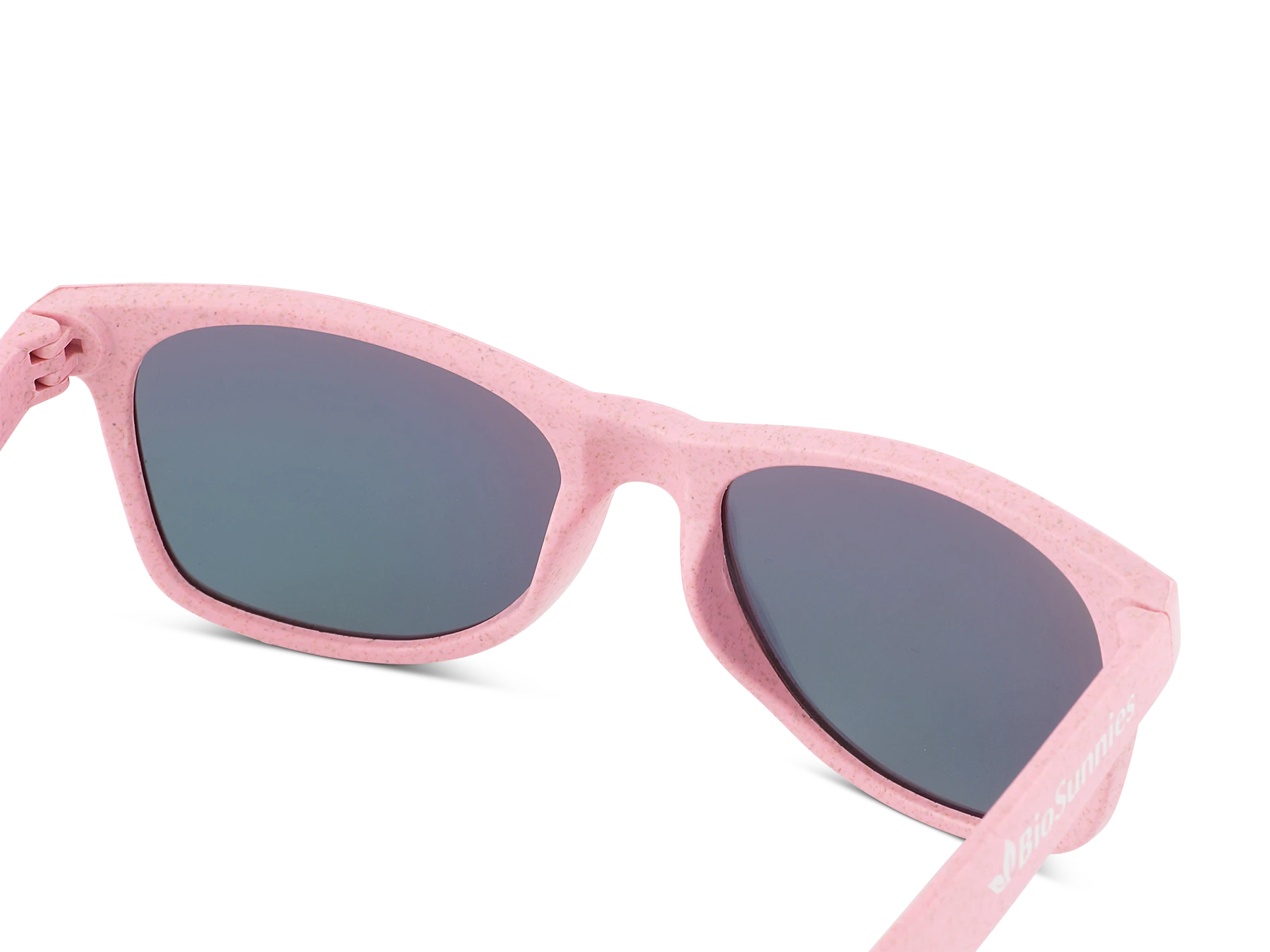Pink sunglasses with dark lenses on a white background