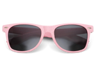 Pink sunglasses with dark lenses on a white background