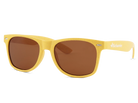 Yellow sunglasses with brown lenses on a white background