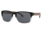 Sunglasses with black frame and dark lenses on a white background