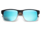 Sunglasses with black frame and blue mirrored lenses on a white background