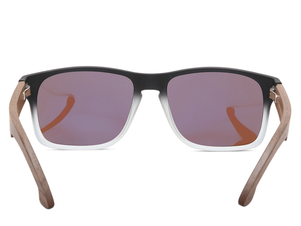 Sunglasses with black and brown frame on a white background