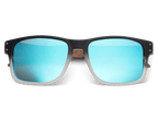 Sunglasses with black frame and blue mirrored lenses on a white background