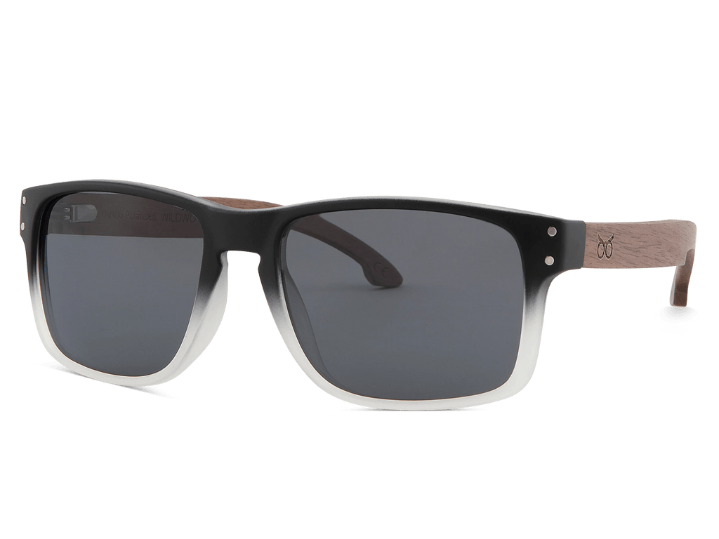 Sunglasses with black frame and dark lenses on a white background