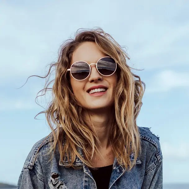 Woman with recycled aluminium sunglasses