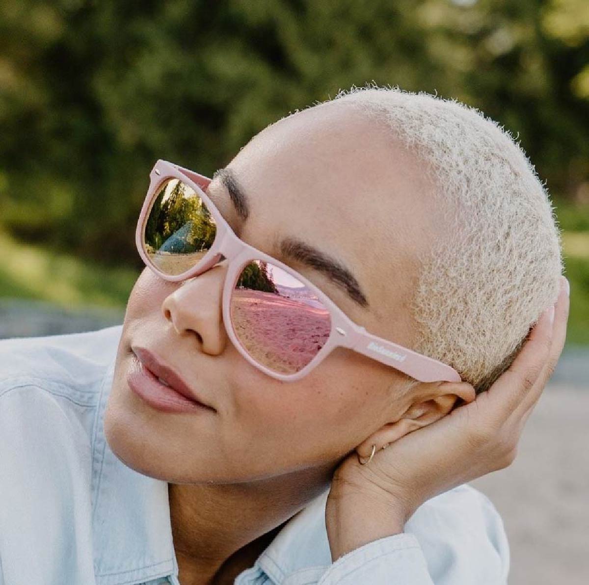 Woman wearing pink mirror biounnies