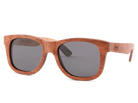 Wooden sunglasses with dark lenses on a white background