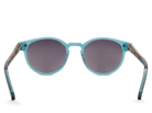 Blue sunglasses with dark lenses on a white background